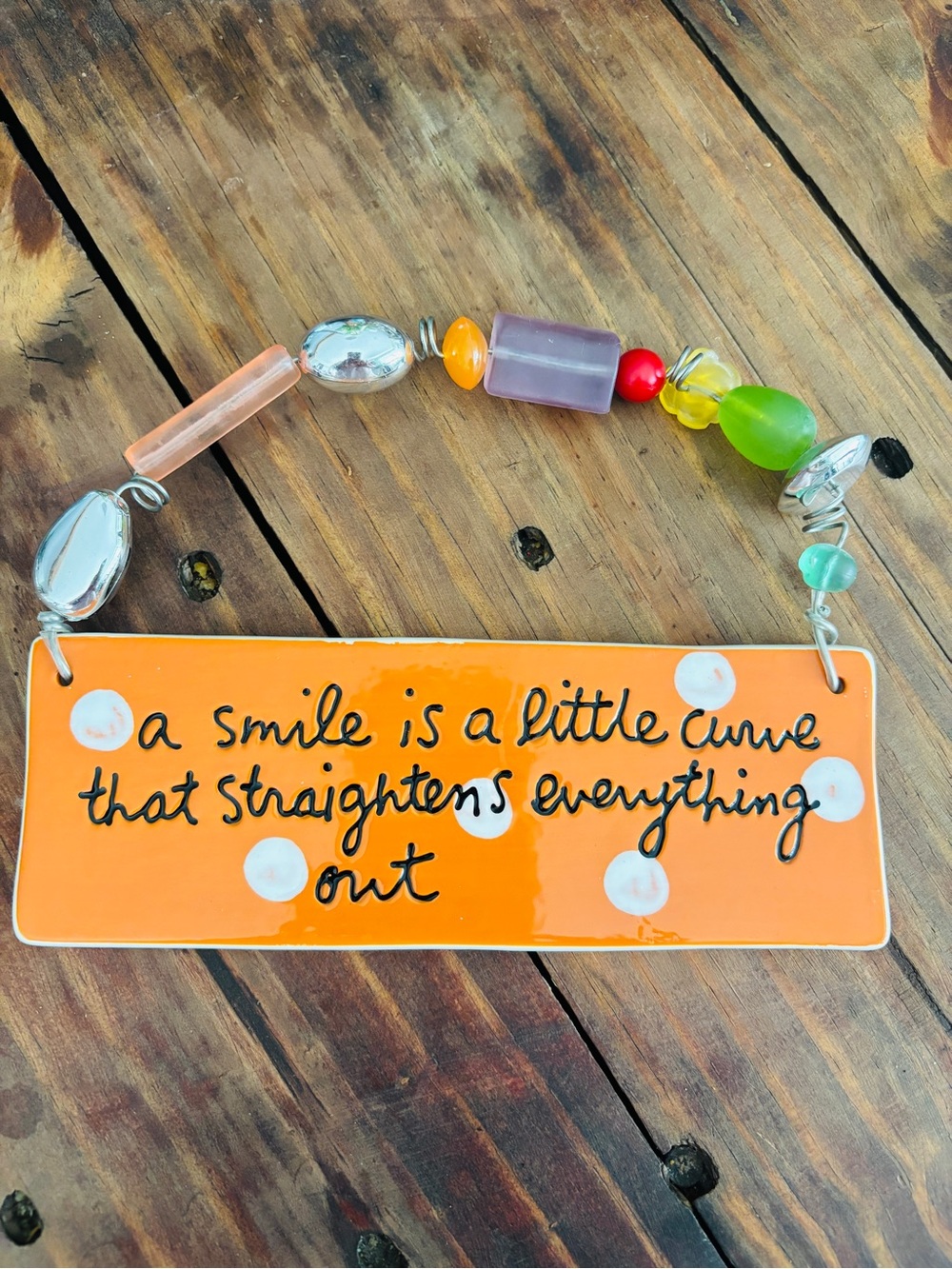 Sandra Magsamen Dept 56 Plaque “A Smile is a curve that straightens”